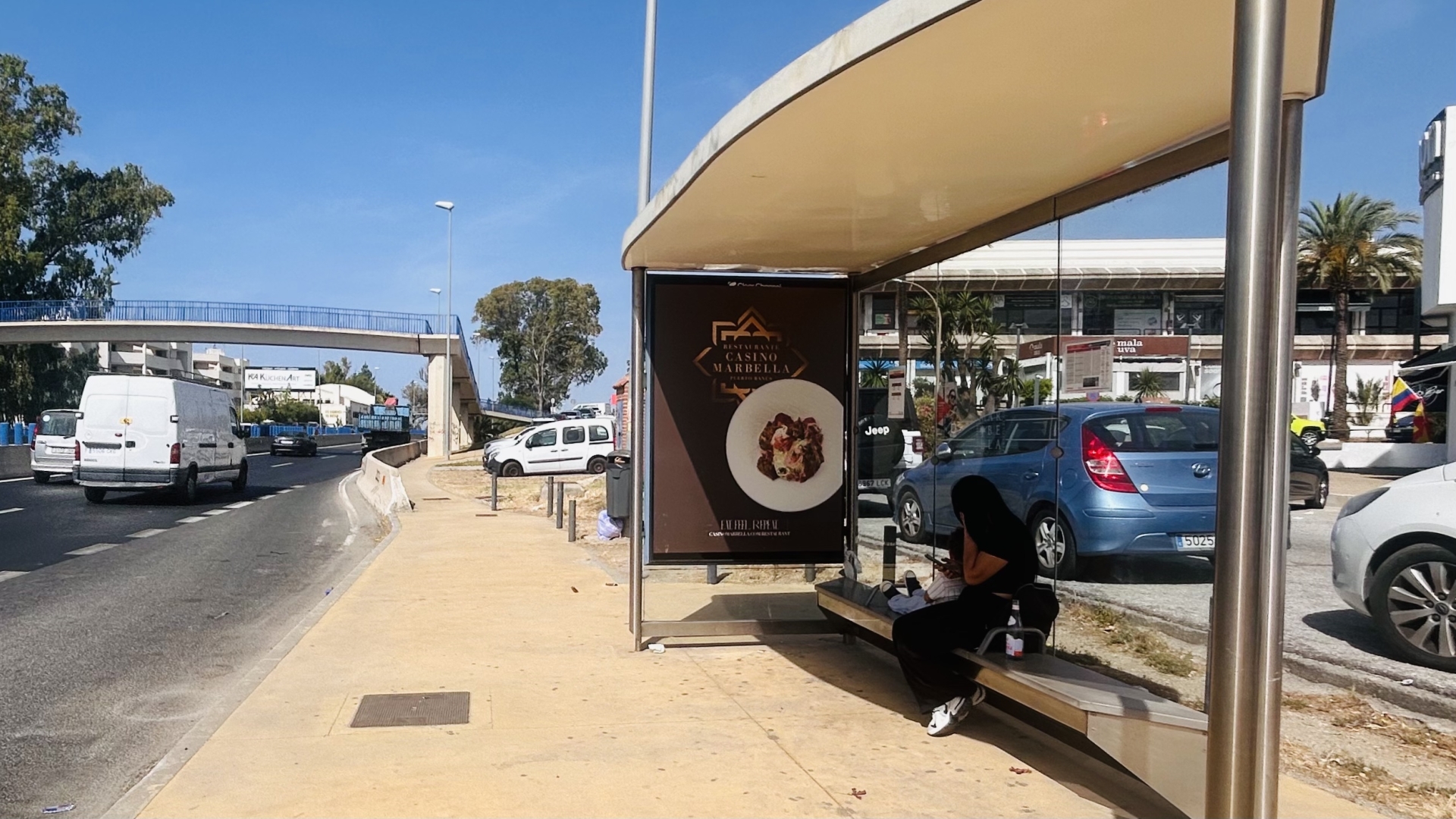 Advertising mupi located on the CN-340, next to Centro Comercial Guadalmina, opposite Asador Guadalmina